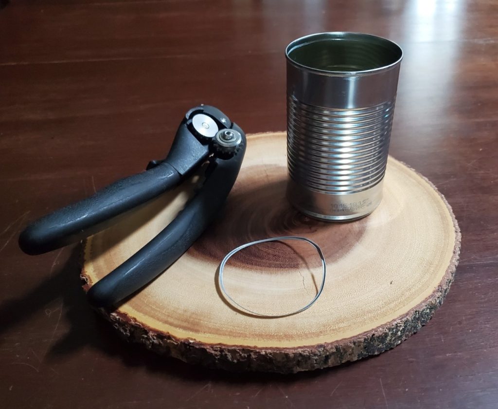 household tin can with can opener