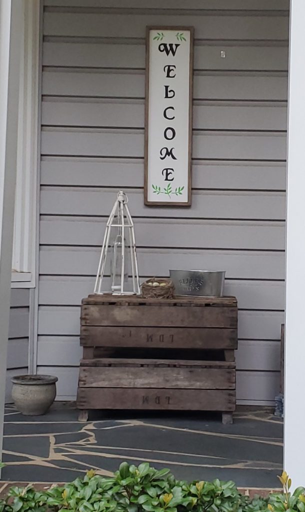Welcome sign on front porch